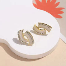 Elegant Gold Earrings with White Accents and Rhinestone Detailing