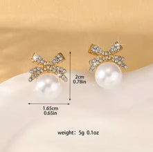 Elegant Pearl and Diamond Bow Earrings