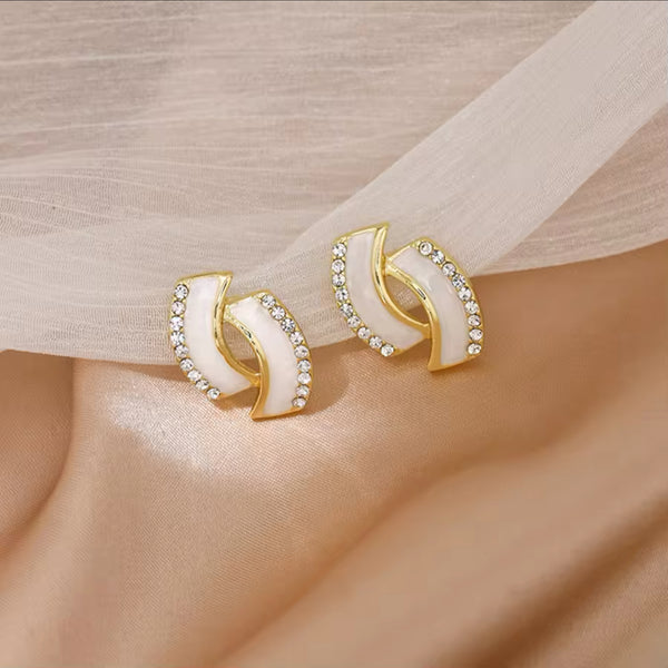 Elegant Gold Earrings with White Accents and Rhinestone Detailing