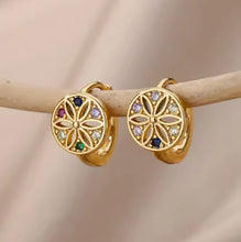 Ornate Gold Earrings with Gemstone Inlay