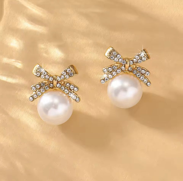 Elegant Pearl and Diamond Bow Earrings