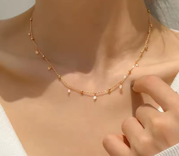 Delicate rose Gold Ball and Disk Necklace