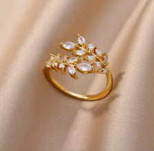 Gold stainless steel adjustable ring with leaf motif