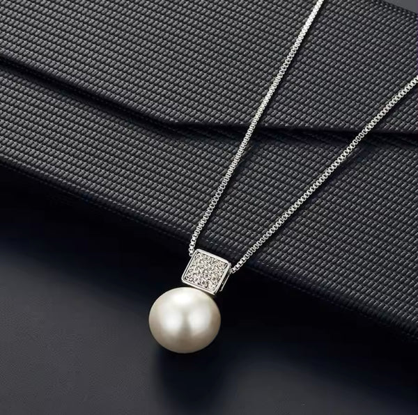 Timeless Elegance: Pearl and Diamond Stainless Steel Jewelry Set