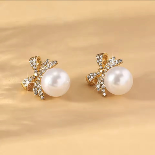 Elegant Pearl and Diamond Bow Earrings