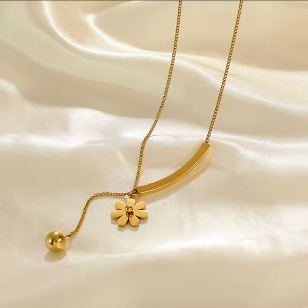 Gold-Tone Stainless Steel Necklace with Floral Pendant and Curved Bar Design