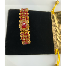 Gold bracelet Adorned with Red simulated gemstones